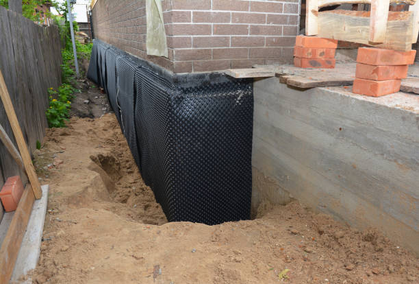 Happy homeowners after waterproofing job in Ventnor City